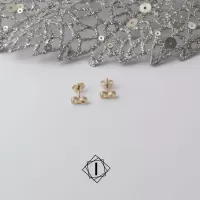 Zlatne minđuše infinity