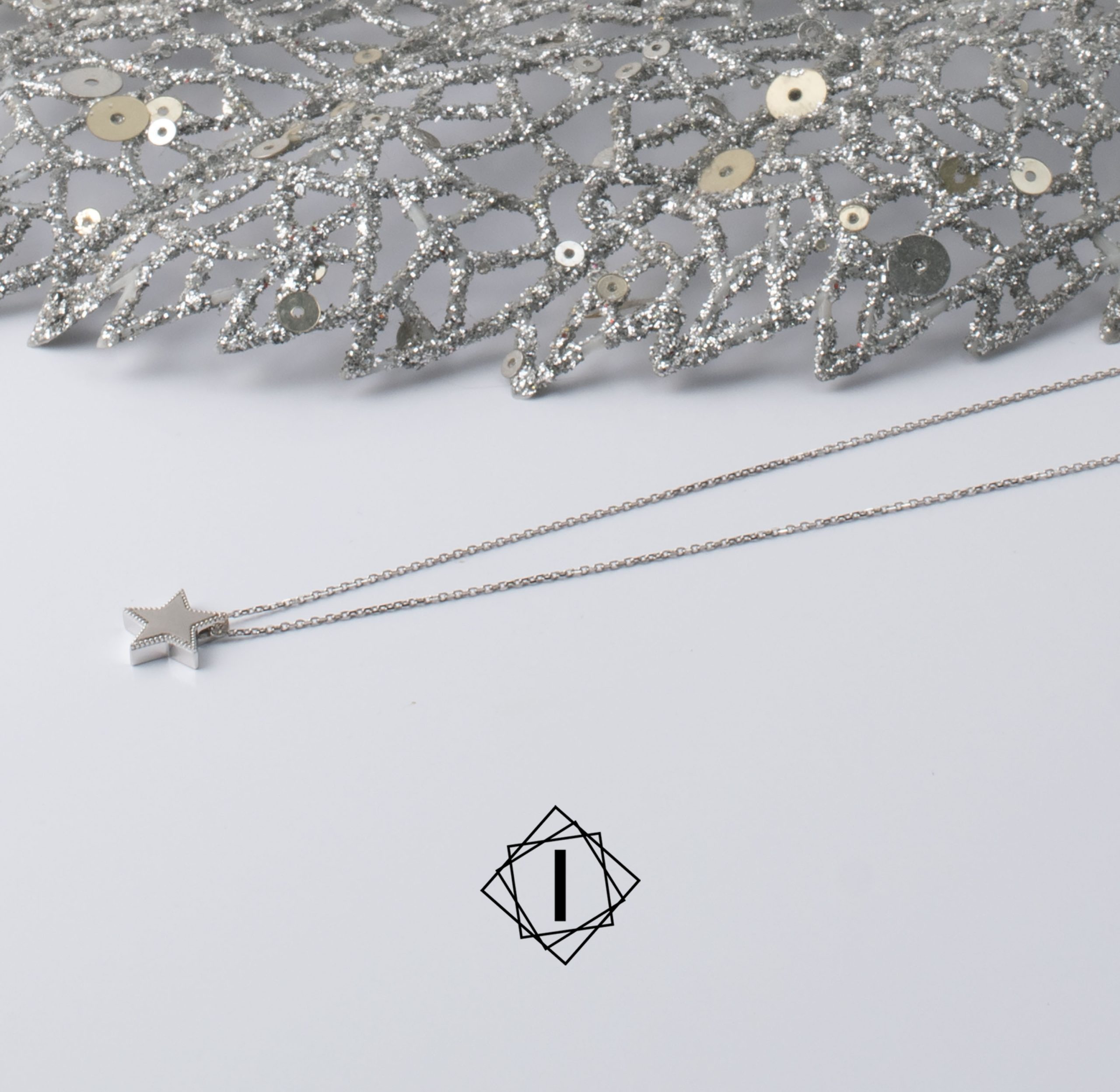 Gold necklace with a star Gold necklace with a star